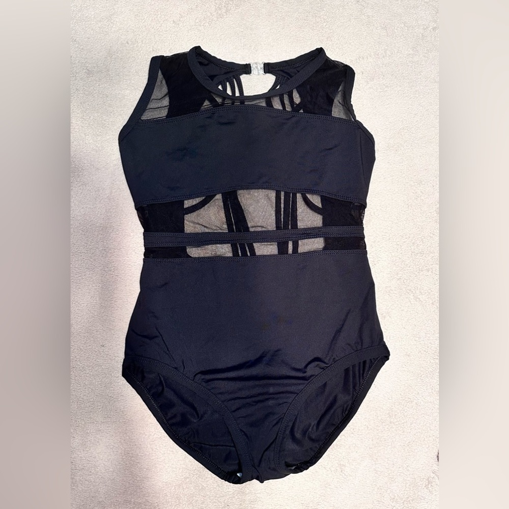 Black leotard with mesh cutouts and cross strap back